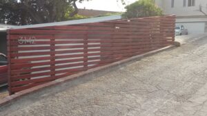 Custom Horizontal Front Yard Fence, Ventura 93003, designed, built & stained by WoodFenceExpert.com
